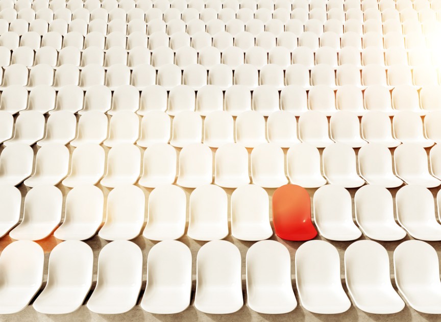 Red chair represents your ideal customer in a sea of clients.Picture