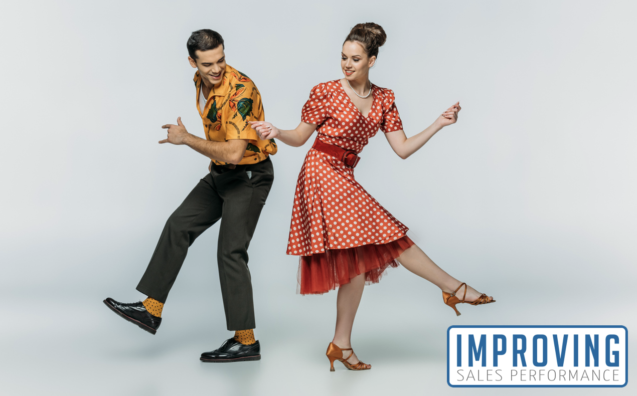 A retro couple dancing illustrates the need for an intentional sales strategy